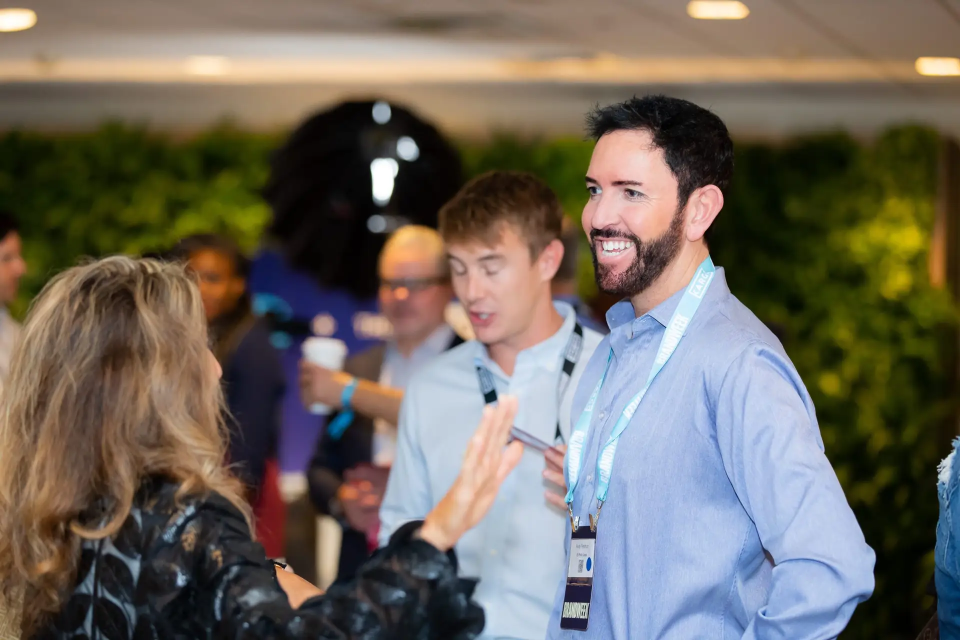 Attendees gathering during a conference coffee break at InterContinental Miami