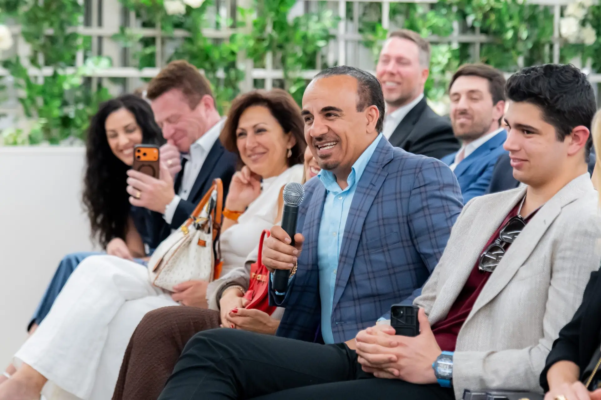 Corporate event photographer capturing guests attending the Pagani Automobili Made in Italy celebration in Miami
