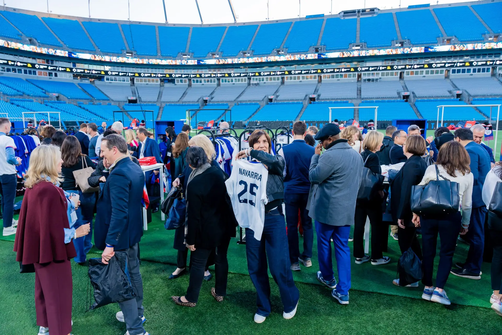 Employees receiving free Charlotte FC jerseys during Bank of America team event