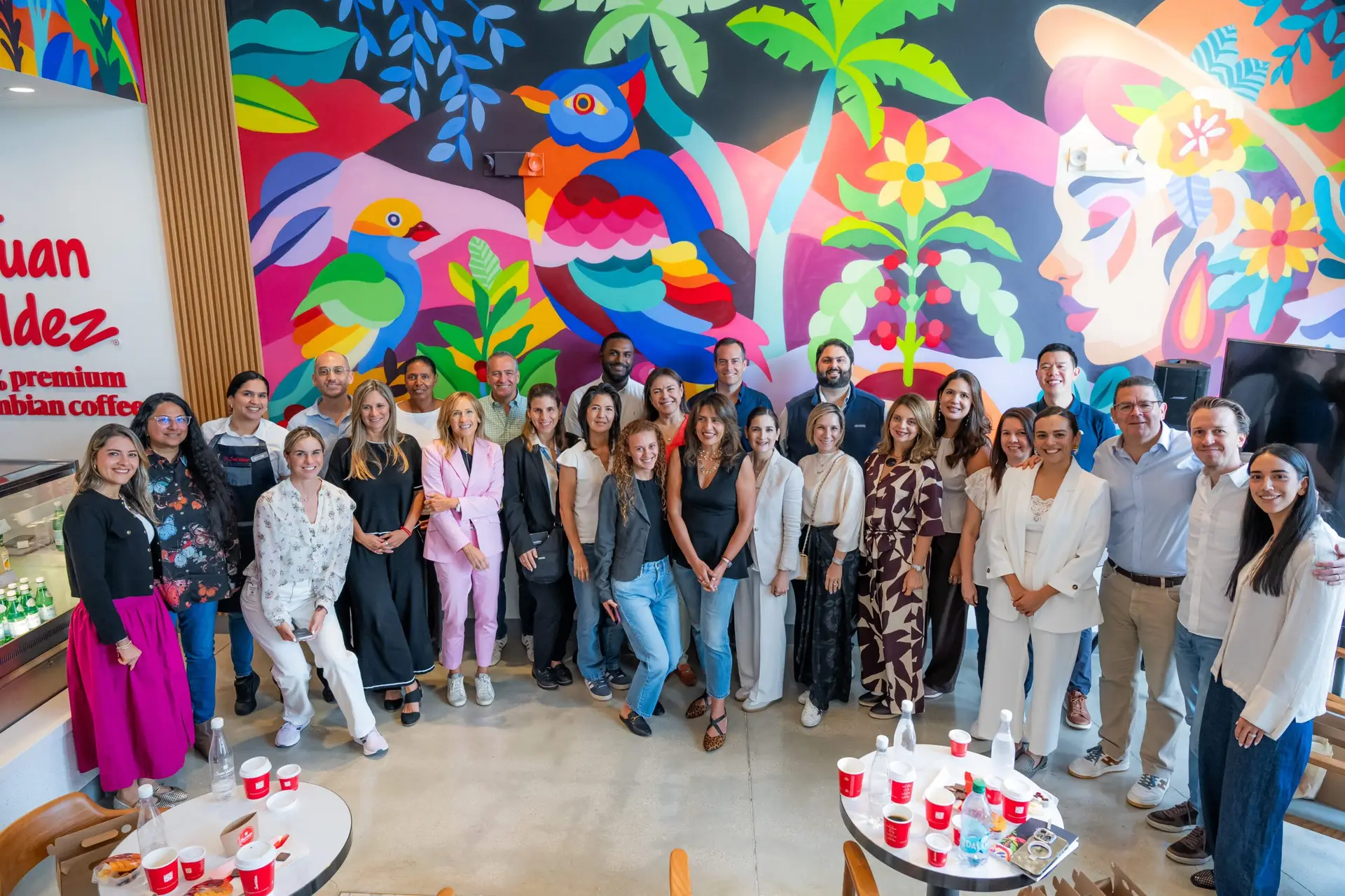 Group photo of Latin American CEOs hosted by Grupo OHLA at Juan Valdez Wynwood - Event Photographer in Miami