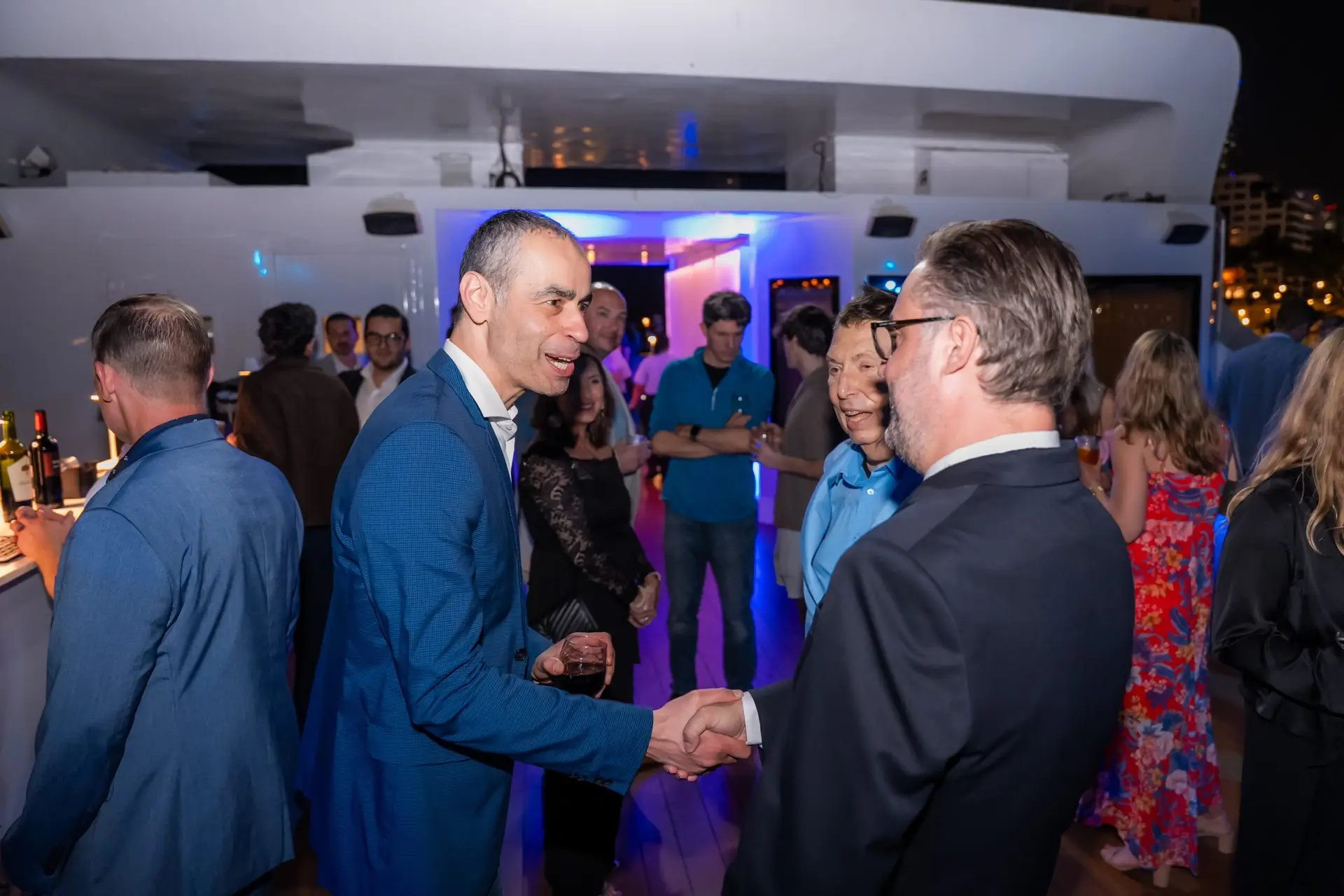 Guests networking SeaFair Miami corporate event reception Photographer