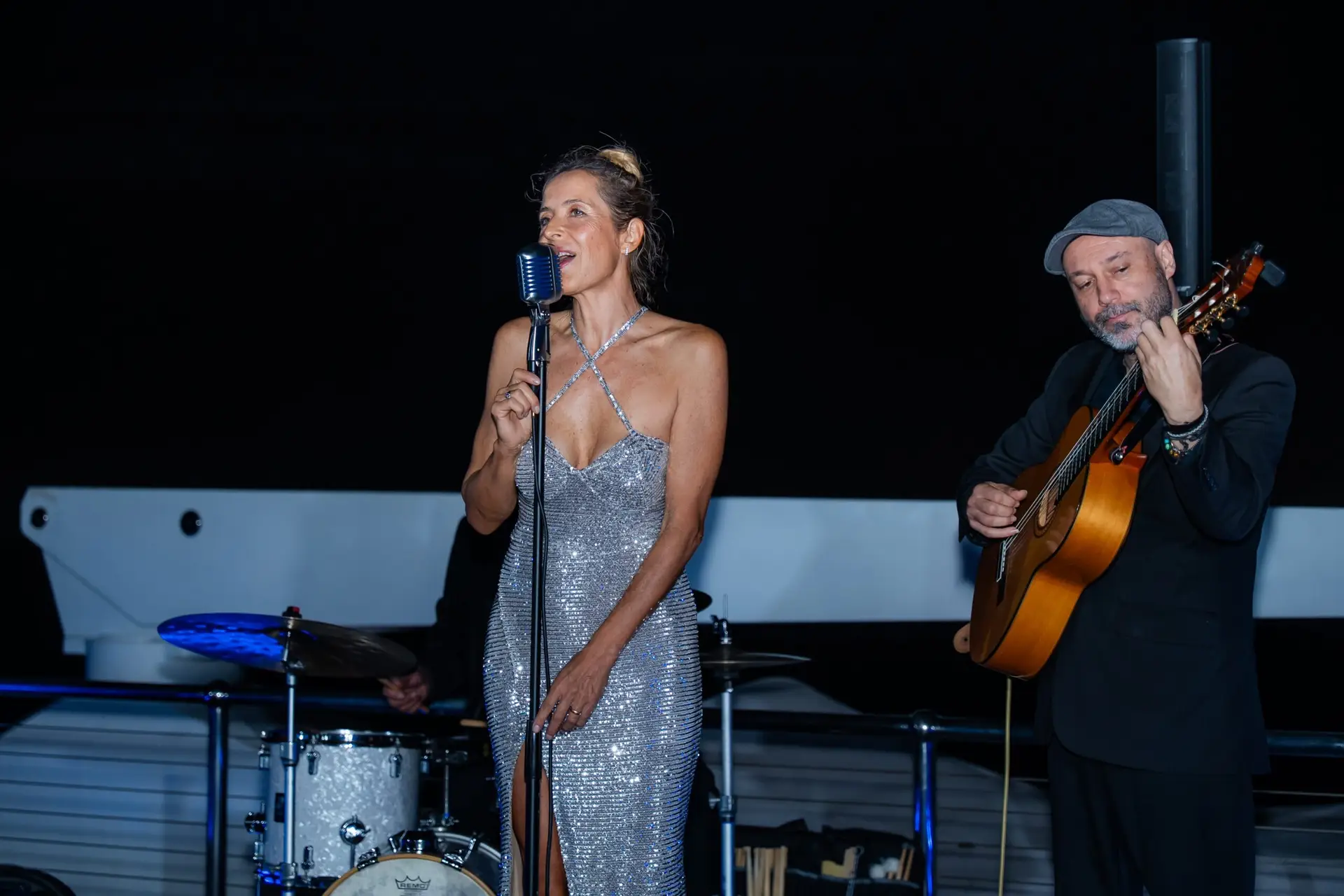 Italian singer performing live during a corporate dinner event on SeaFair Miami