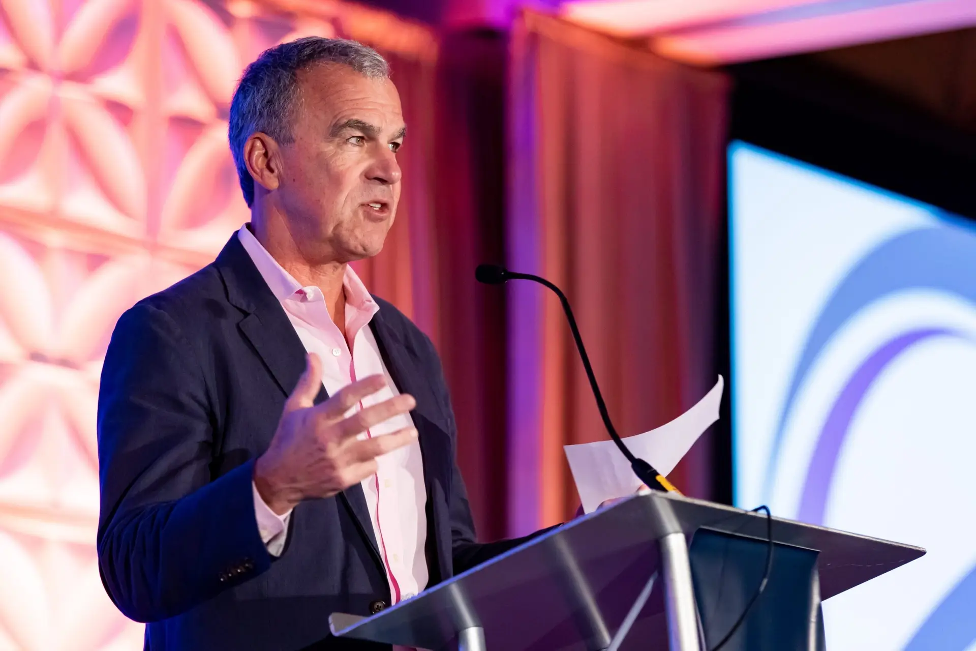 Keynote Speaker on Stage - Corporate Event Photographer