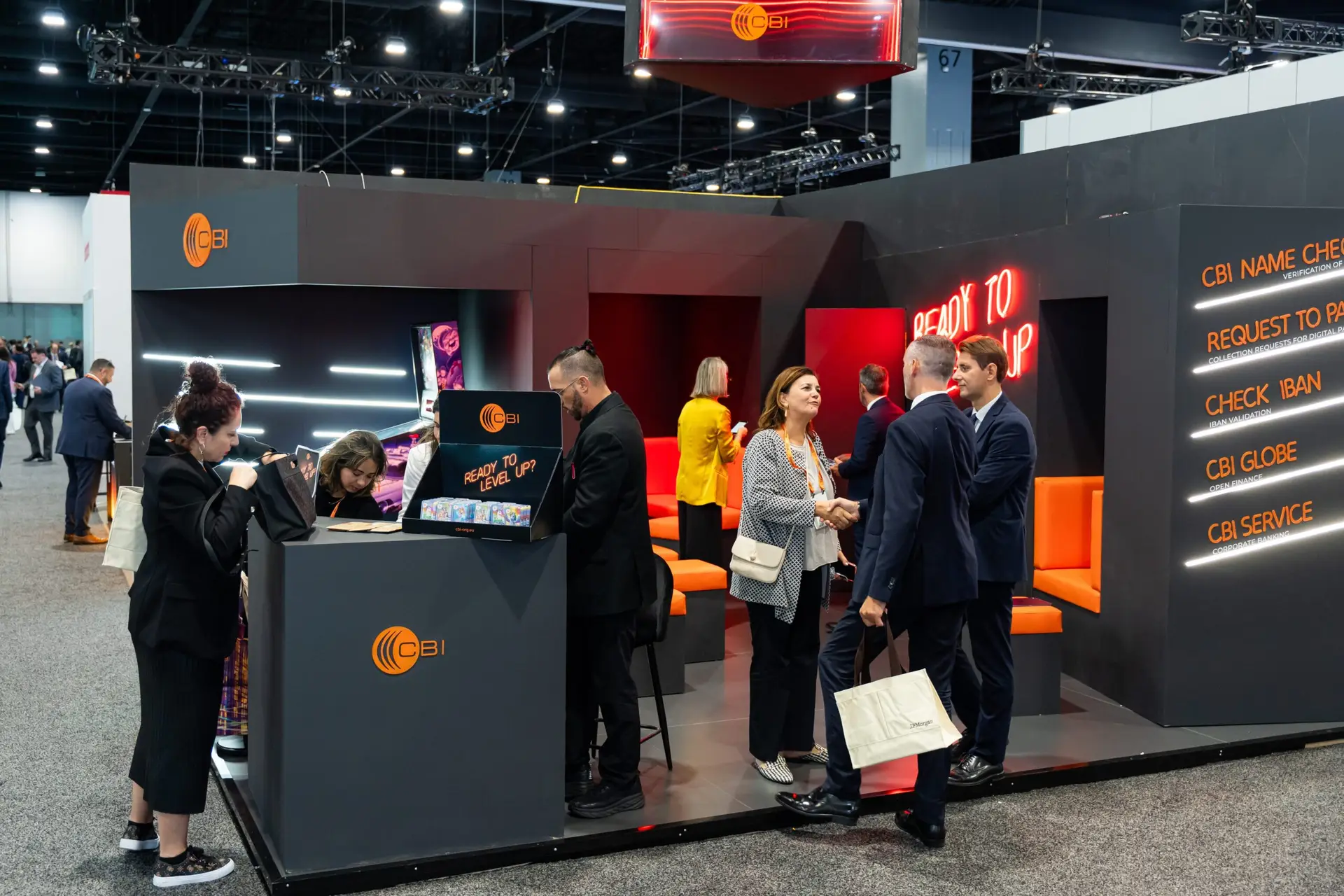 CBI team welcoming visitors at its Sibos exhibition booth